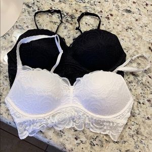 Two Victoria Secret Pink bralettes.